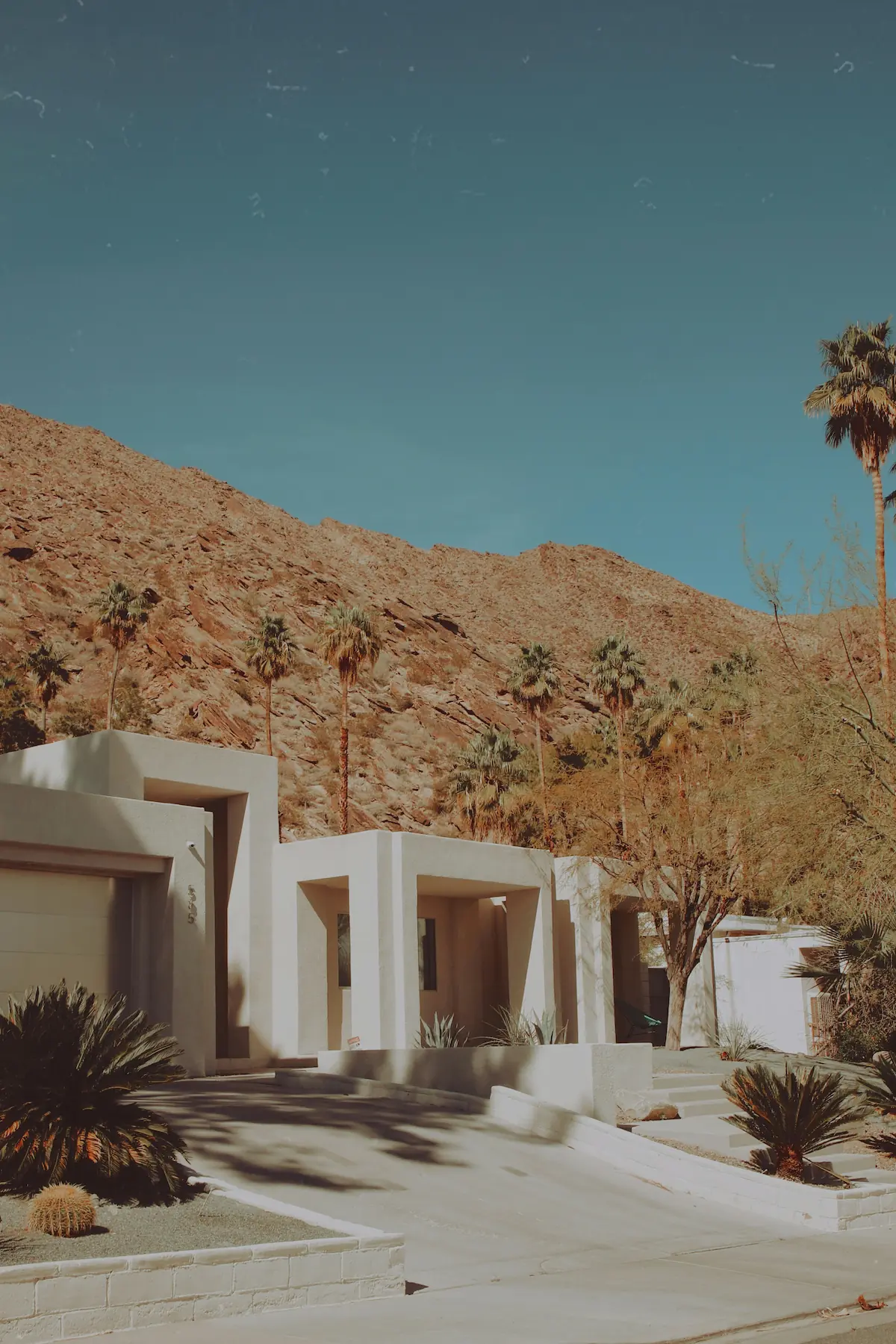 High-end patio with desert landscaping and stonework